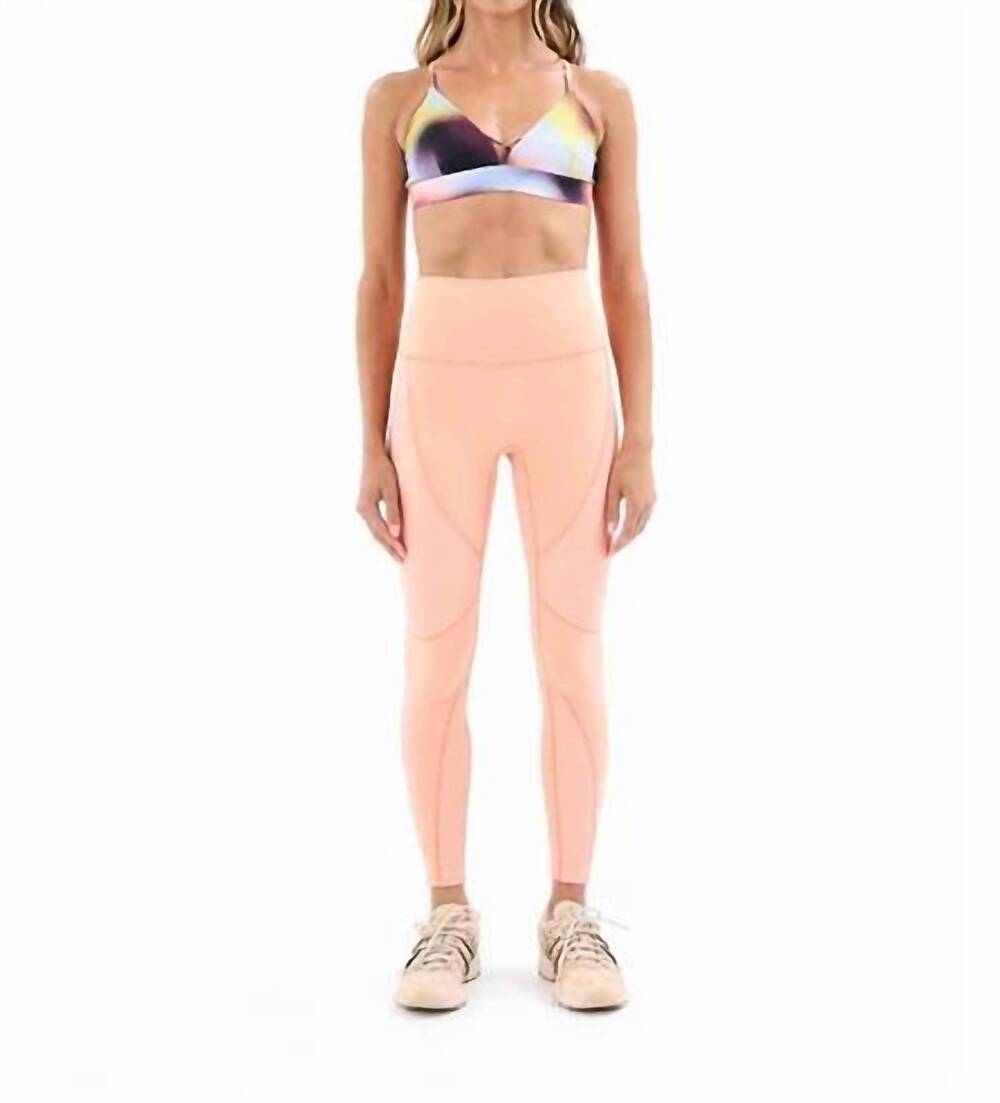 NEW P.E. NATION women's free play legging in cantalope